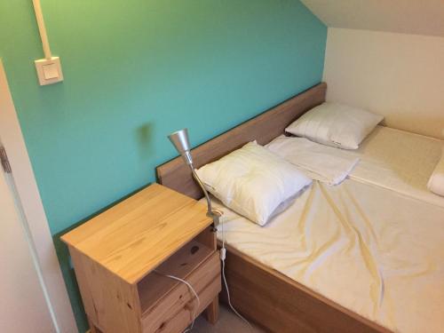 Cama o camas de una habitación en Huisje Zeegenoegen Oostduinkerke Koksijde