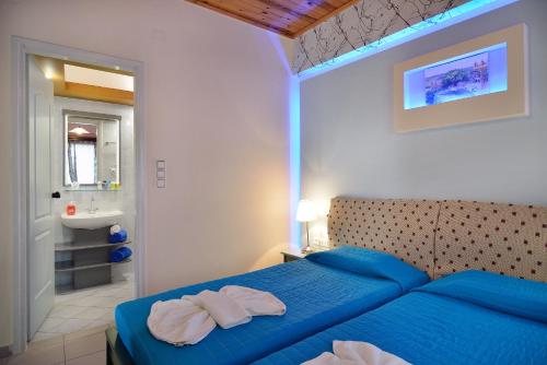Postel nebo postele na pokoji v ubytování Mythos- Platanias- Hotel -Apts
