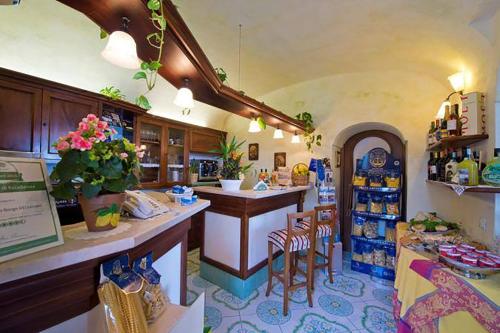 Cuisine ou kitchenette dans l'établissement L'Antico Borgo Dei Limoni