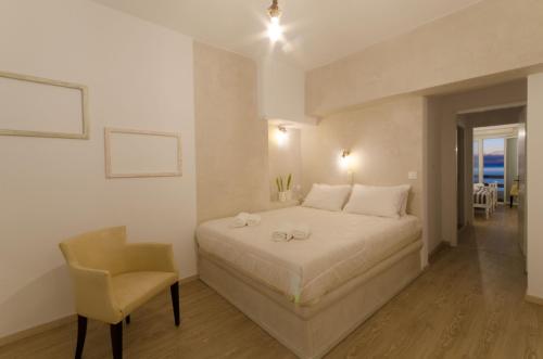 Ένα ή περισσότερα κρεβάτια σε δωμάτιο στο Nikolas Hotel