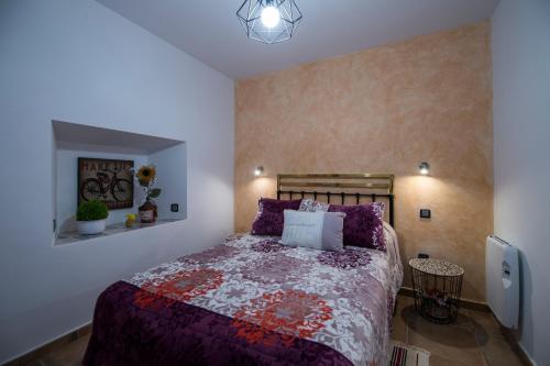 Postel nebo postele na pokoji v ubytování La Casa De Las Abuelas