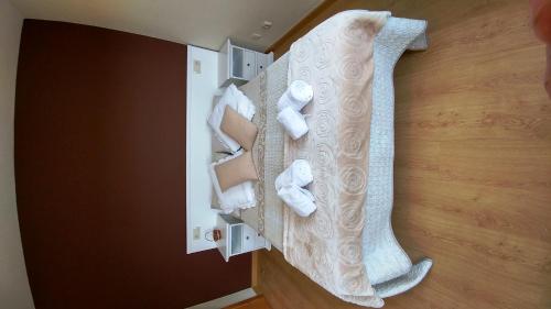 a door with rolled towels sticking out of it at Casa Tia Teresa in Salceda