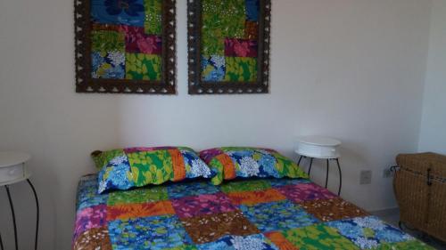 Ένα ή περισσότερα κρεβάτια σε δωμάτιο στο Condomínio Clube Wembley Tennis