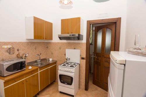 Cuina o zona de cuina de Le Nereidi B&B