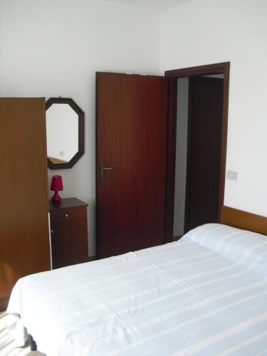 A bed or beds in a room at Casa Armanda