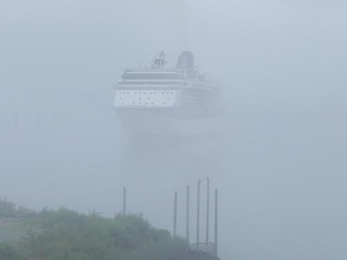 a cruise ship in the middle of the fog at Ramada by Wyndham Juneau in Juneau