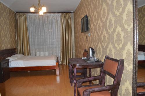 Land Hotelにあるベッド