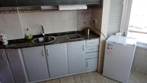 Kuchyň nebo kuchyňský kout v ubytování Promar