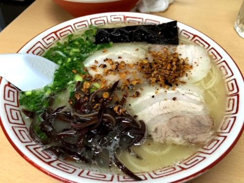 a plate of food with noodles and vegetables on a table at Satsuki Bessou in Tamana