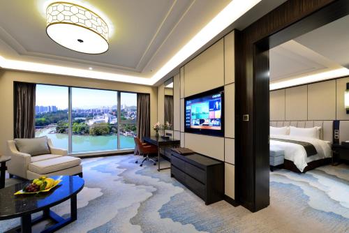 Fuzhou Lakeside Hotelにあるテレビまたはエンターテインメントセンター