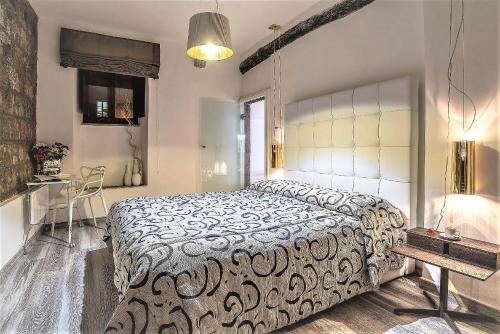 Un pat sau paturi într-o cameră la iRoom Civita
