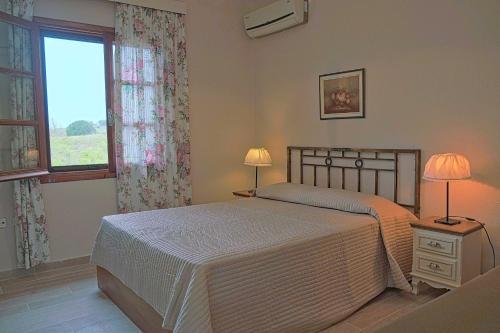 Ένα ή περισσότερα κρεβάτια σε δωμάτιο στο Villa Alba Chiara