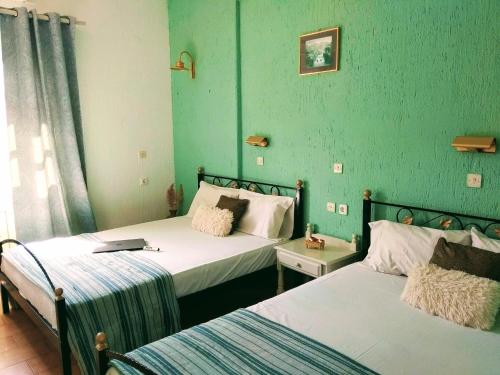 Postel nebo postele na pokoji v ubytování Orion Apartments