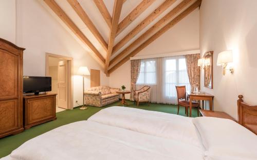Кровать или кровати в номере Residence Hotel Gasser