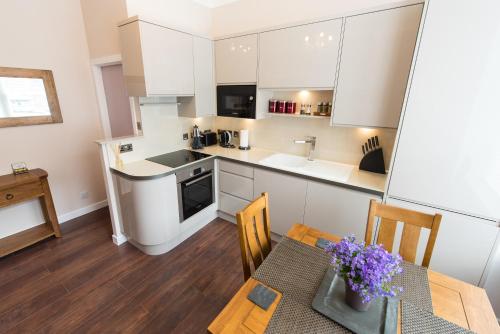 A kitchen or kitchenette at The Harbour Tower A/D 