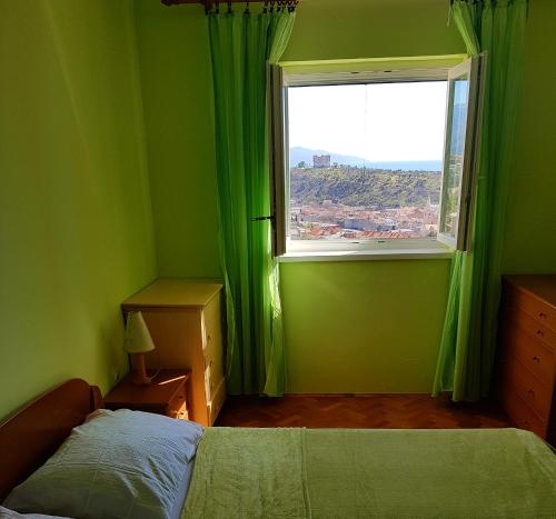 Giường trong phòng chung tại Apartment Jakov