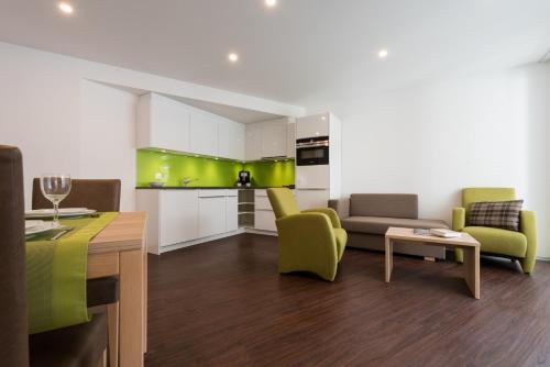 Η κουζίνα ή μικρή κουζίνα στο Apartments Alpenrose