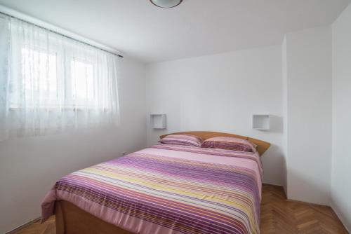 Postel nebo postele na pokoji v ubytování Apartment Lavanda
