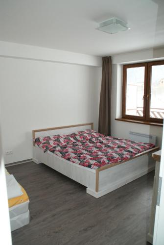 Postel nebo postele na pokoji v ubytování Panorama Donovaly 35A