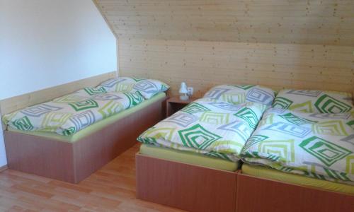 Postel nebo postele na pokoji v ubytování Na Vejměnku
