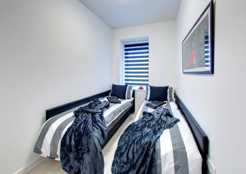 Katil atau katil-katil dalam bilik di Luxury apartment CRYSTAL
