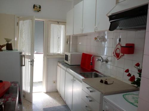 Η κουζίνα ή μικρή κουζίνα στο Apartamento Do Silva