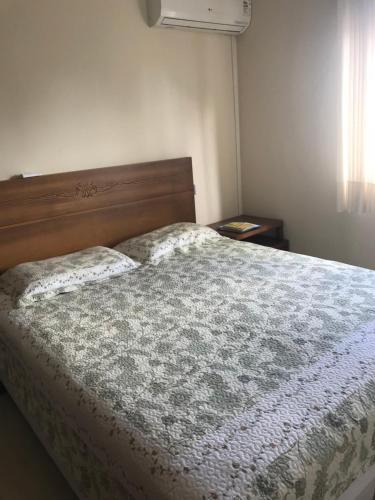 Кровать или кровати в номере Lindo apartamento no centro de Canela
