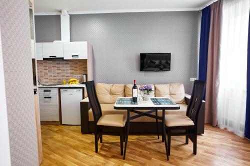 Кухня или кухненски бокс в ANTARES Apart hotel