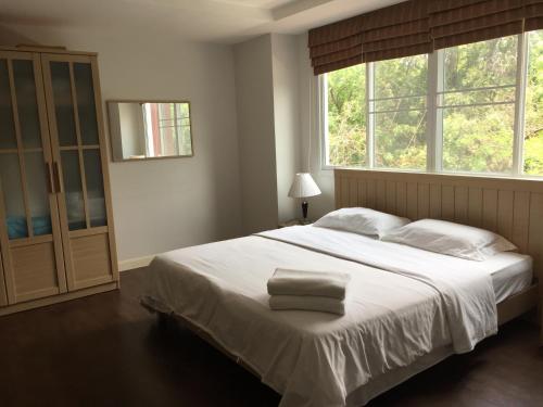 Postel nebo postele na pokoji v ubytování Jomtien Beach Penthouses Condo