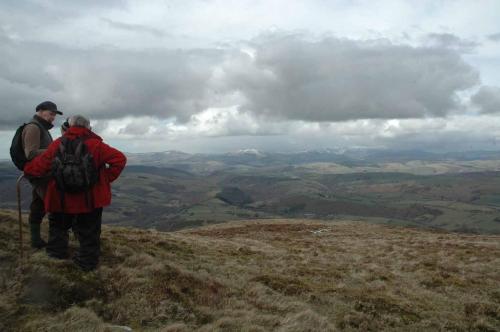 two people standing on the top of a hill at Mid Wales Arts B&B in Caersws