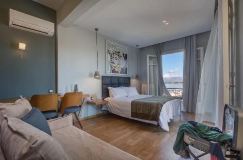 Ένα ή περισσότερα κρεβάτια σε δωμάτιο στο Leto Nuevo Hotel