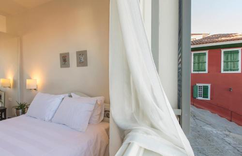 Ένα ή περισσότερα κρεβάτια σε δωμάτιο στο Leto Nuevo Hotel