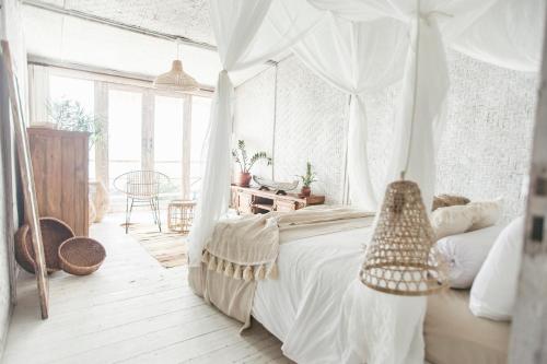 Ένα ή περισσότερα κρεβάτια σε δωμάτιο στο Dreamsea Bali