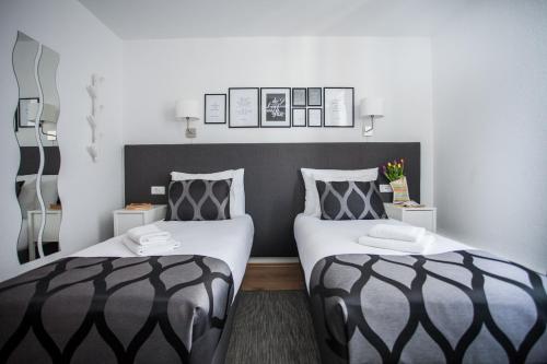 Letto o letti in una camera di Villa Ivanka