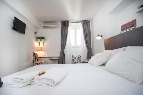 Letto o letti in una camera di Villa Ivanka