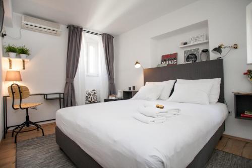 Letto o letti in una camera di Villa Ivanka