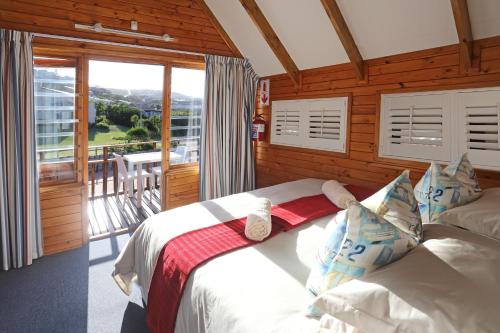 Posteľ alebo postele v izbe v ubytovaní Brenton on Sea Cottages