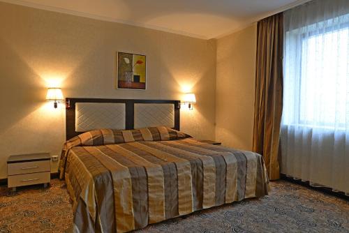 Merian Palace Hotelにあるベッド