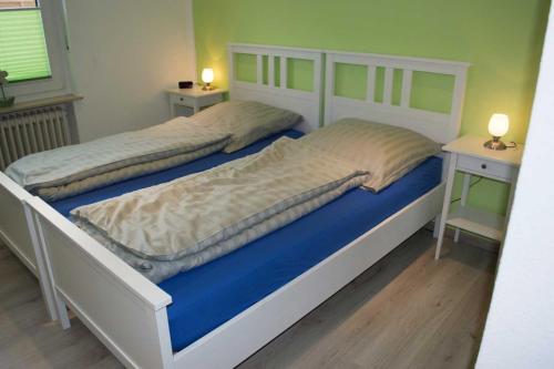Ein Bett oder Betten in einem Zimmer der Unterkunft Ferienhaus Zur Edertalsperre