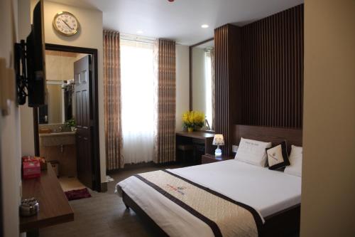 Katil atau katil-katil dalam bilik di Huynh Duc 2 Hotel