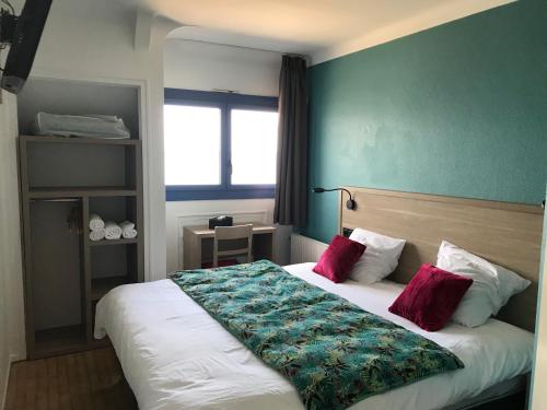 Postel nebo postele na pokoji v ubytování Hôtel Restaurant L'Escale d'en Arz