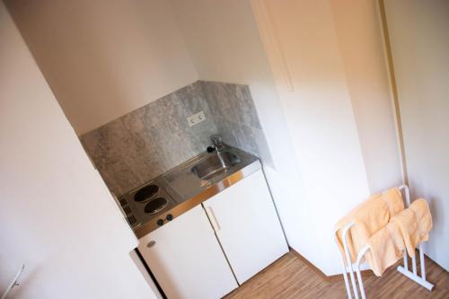 Kuchyň nebo kuchyňský kout v ubytování Apartment Kurt