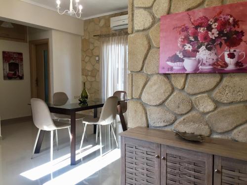 Posedenie v ubytovaní Amfithea House