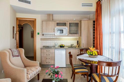 Cucina o angolo cottura di Apartamentos Turísticos Casa de La Borrega