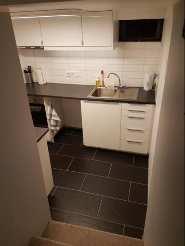 Una cocina o kitchenette en Ubak Guesthouse