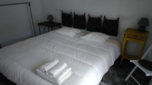Postel nebo postele na pokoji v ubytování Vasco Santana Guesthouse
