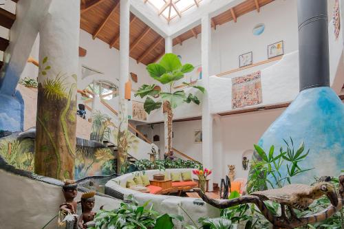 a large room with a fountain in the middle at Finca Rosa Blanca Coffee Farm and Inn in Heredia