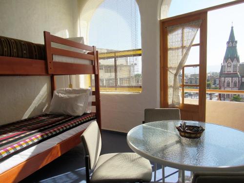 Krevet ili kreveti na sprat u jedinici u okviru objekta Apartamento Terra Amata Arica