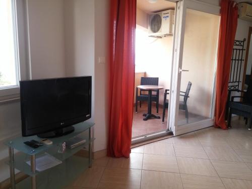 TV a/nebo společenská místnost v ubytování Casa del Sole