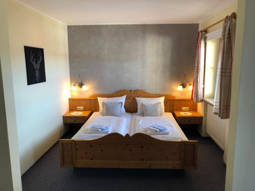 Postel nebo postele na pokoji v ubytování Landhaus Sonnenbichl